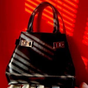 Selling a black authentic Ferragamo bag